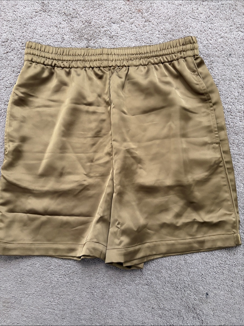 SKIMS Satin-Feel Relaxed Lounge Shorts in bronzed gold